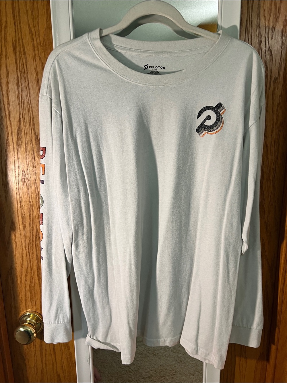 Peloton White Long Sleeve Tee with Multicolor Logo and Sleeve Text